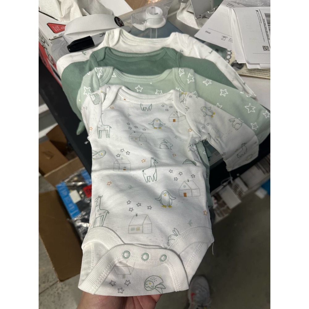 New with Tags Set of 4 onesies - long sleeve - NB